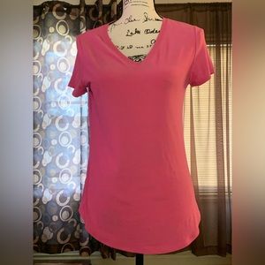 Pink V-neck shirt